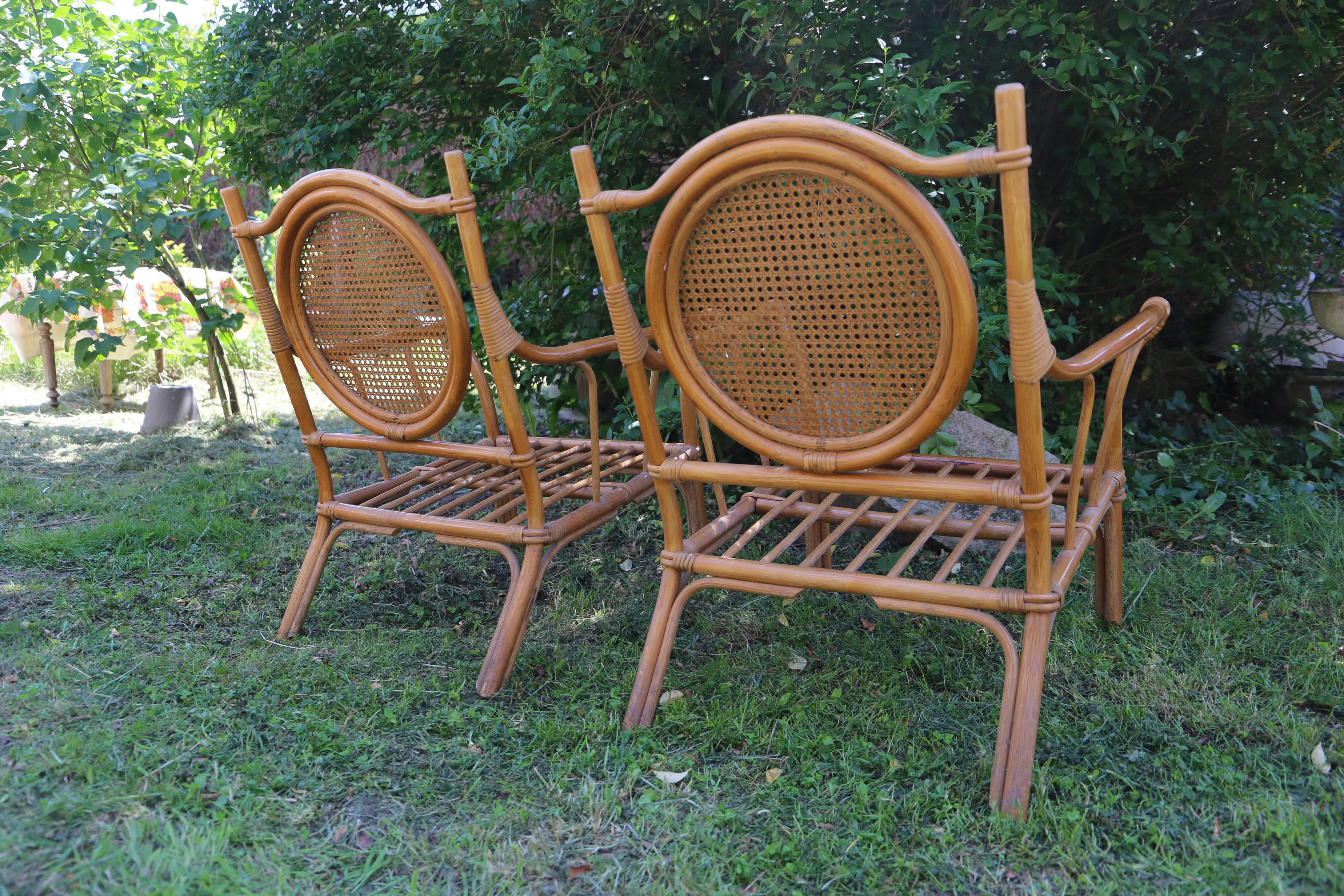 Duo of vintage rattan armchairs