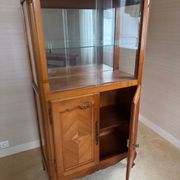 Louis XV style display cabinet, glass doors and chevron panels.