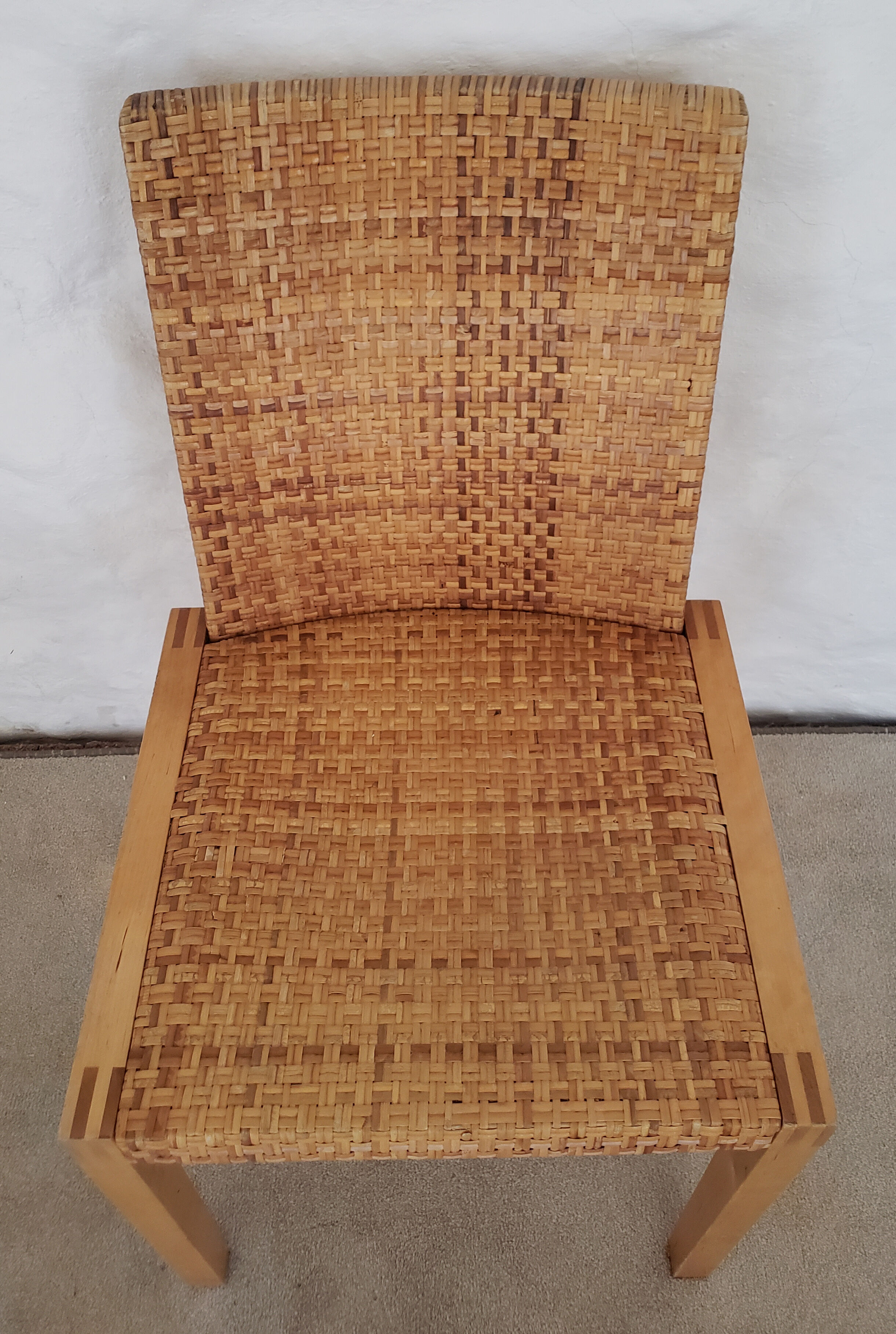 5 wooden and rattan chairs