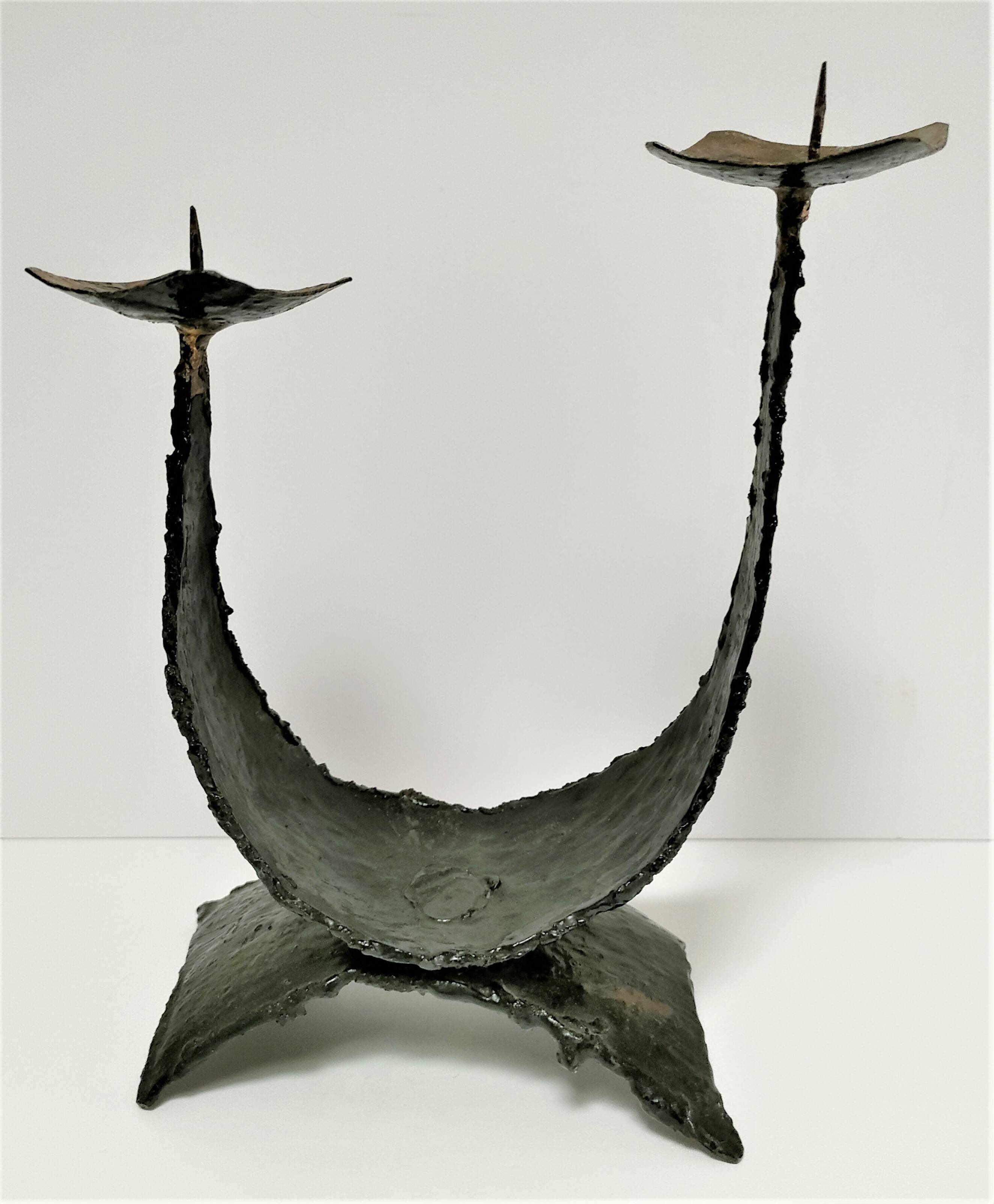 Pair of brutalist design metal candlesticks