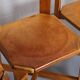 Set of 4 dining chairs in elm wood and cognac leather.