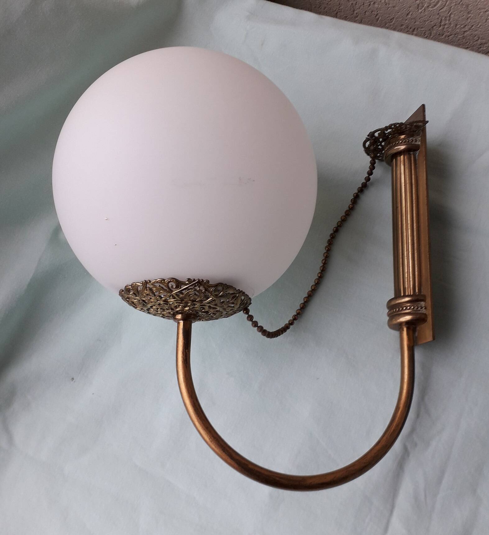 Pair of metal and opaline wall lights