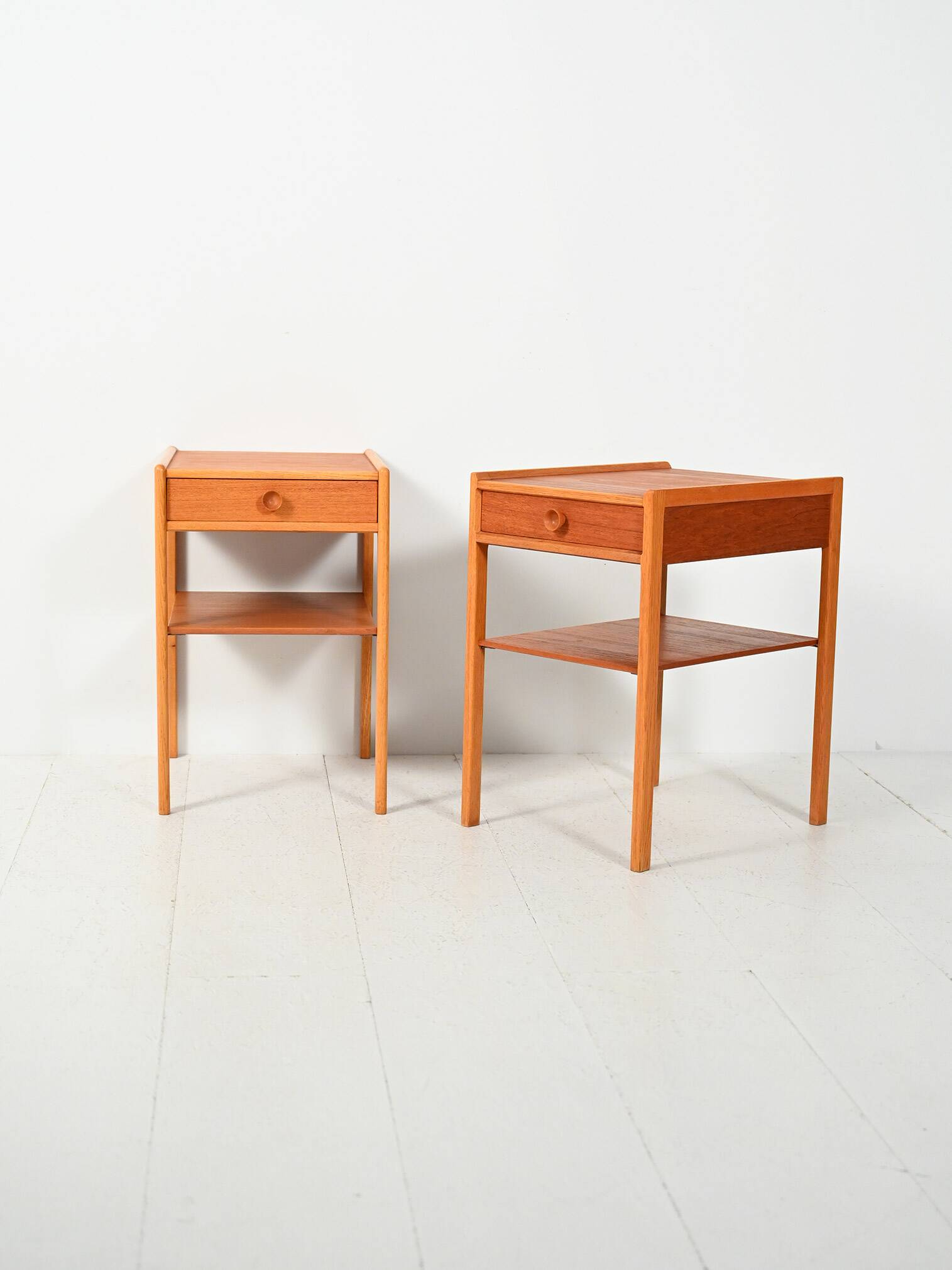 Pair of Scandinavian bedside tables from the 1950s–60s with carved handle