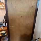 Beveled mirror with wooden contours
