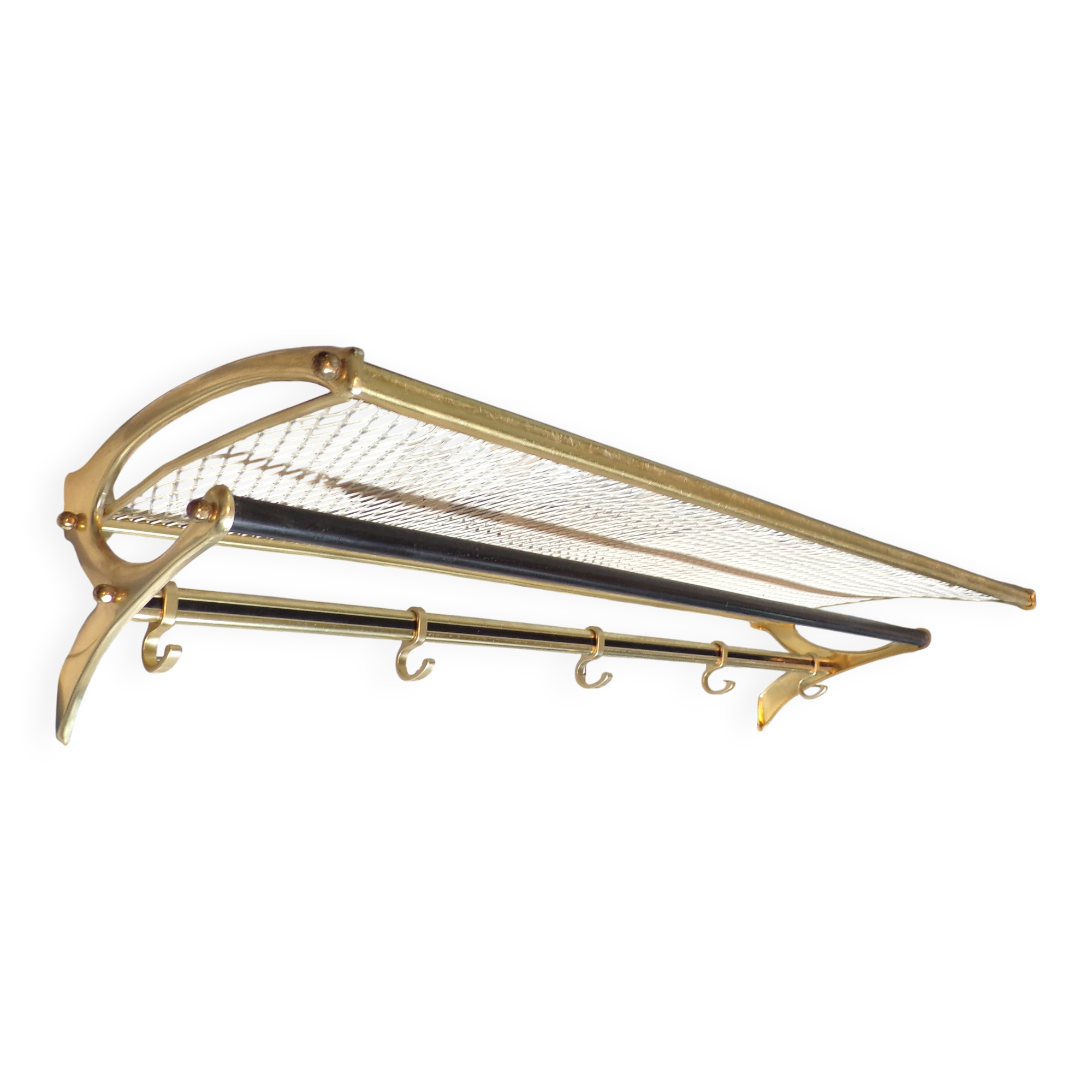 Vintage coat rack in the style of a train luggage rack.