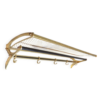 Vintage coat rack in the style of a train luggage rack.