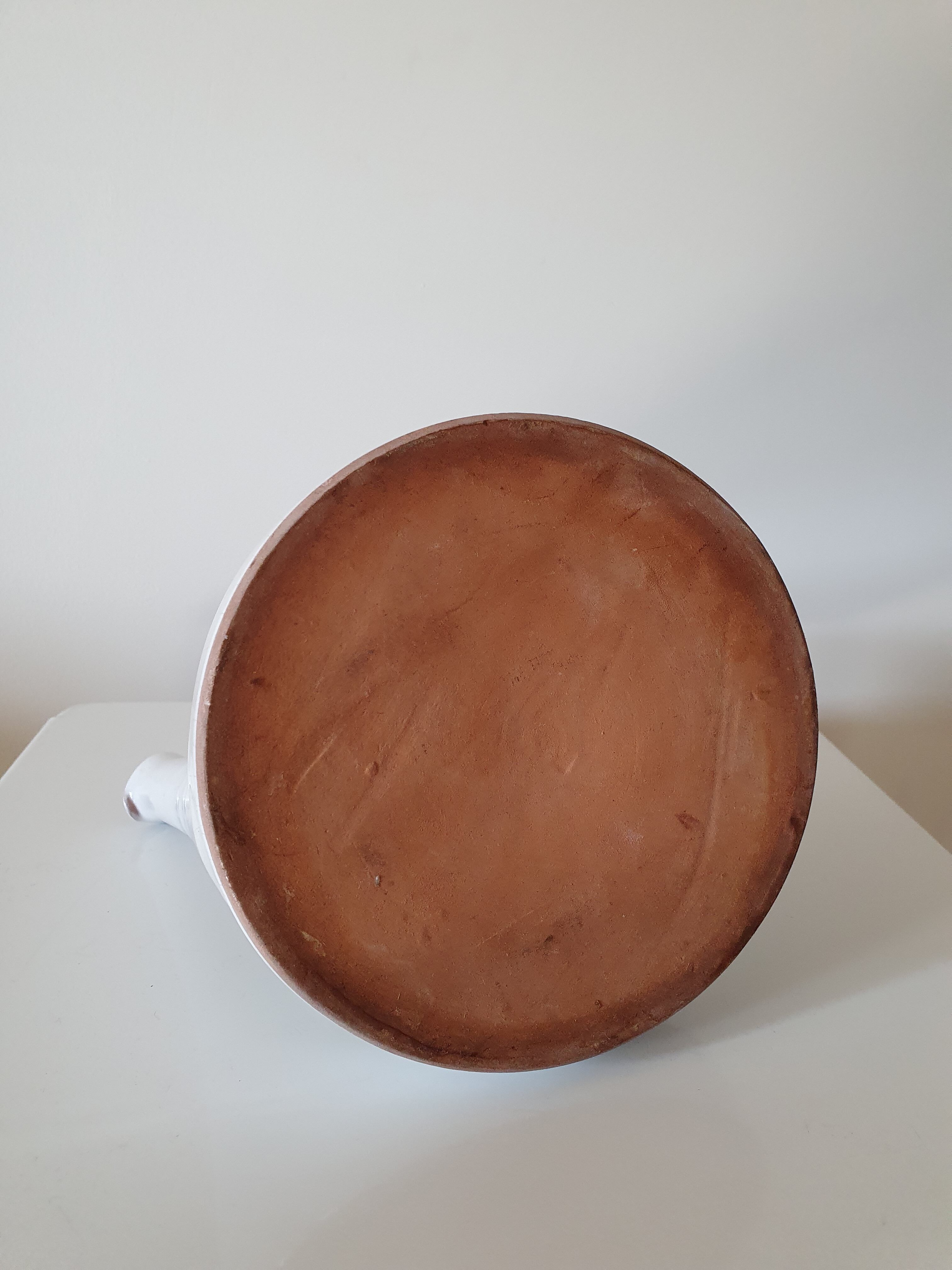 White earthenware pitcher