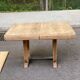 Art Deco dining table with a central pedestal, stripped in solid oak, with 2 extensions.