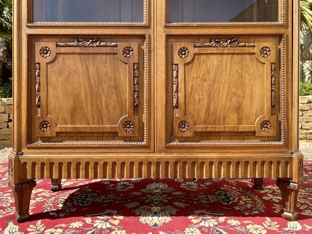 Louis XVI-style walnut library showcase