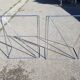 Vintage steel wire desk with chrome trestles and smoked glass top