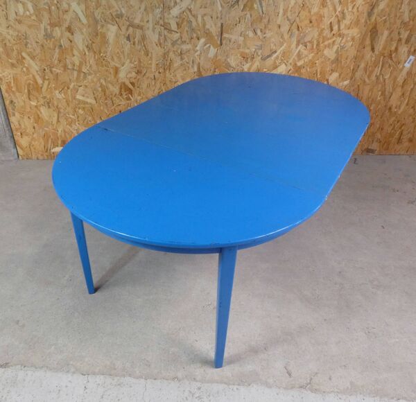 table ronde avec 4 chaises et 2 rallonges