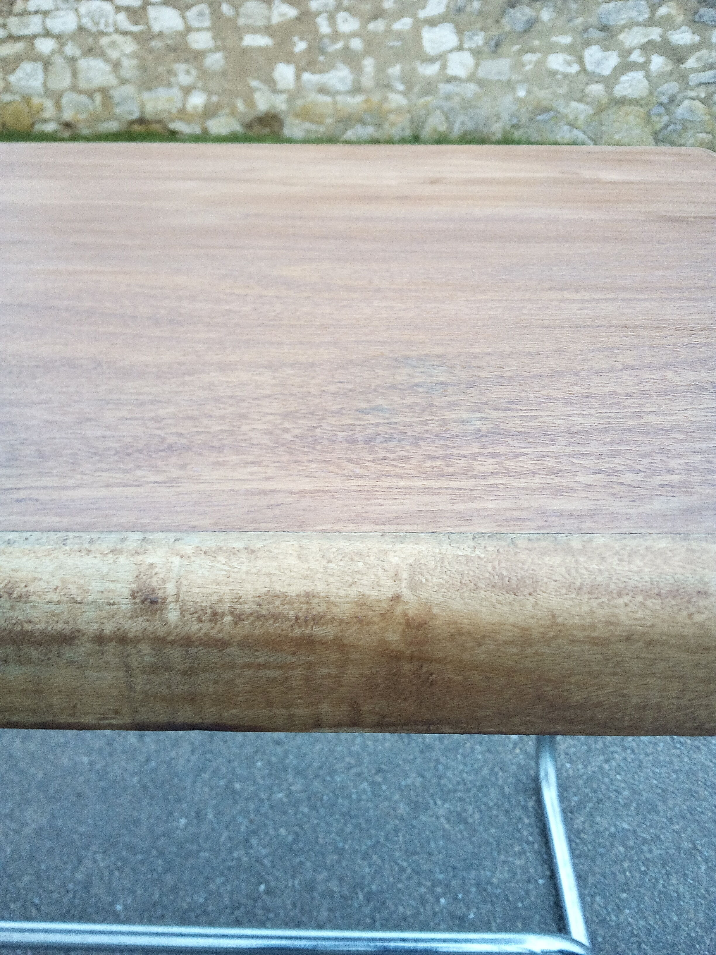 Old table in chrome steel and wood