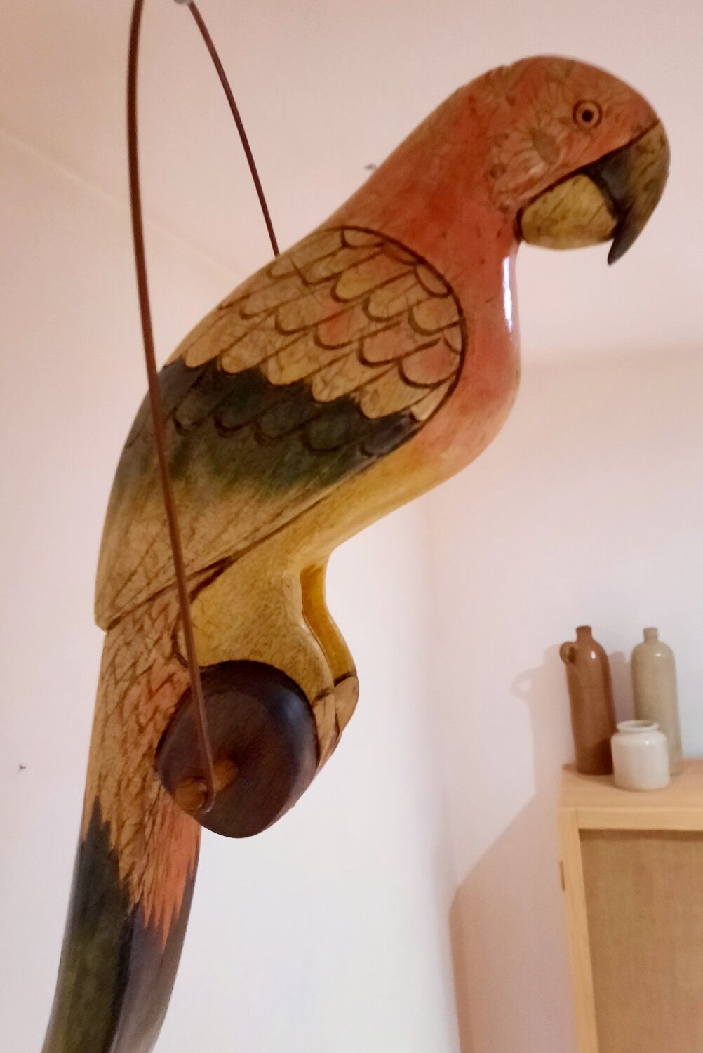 Wooden parrot suspension