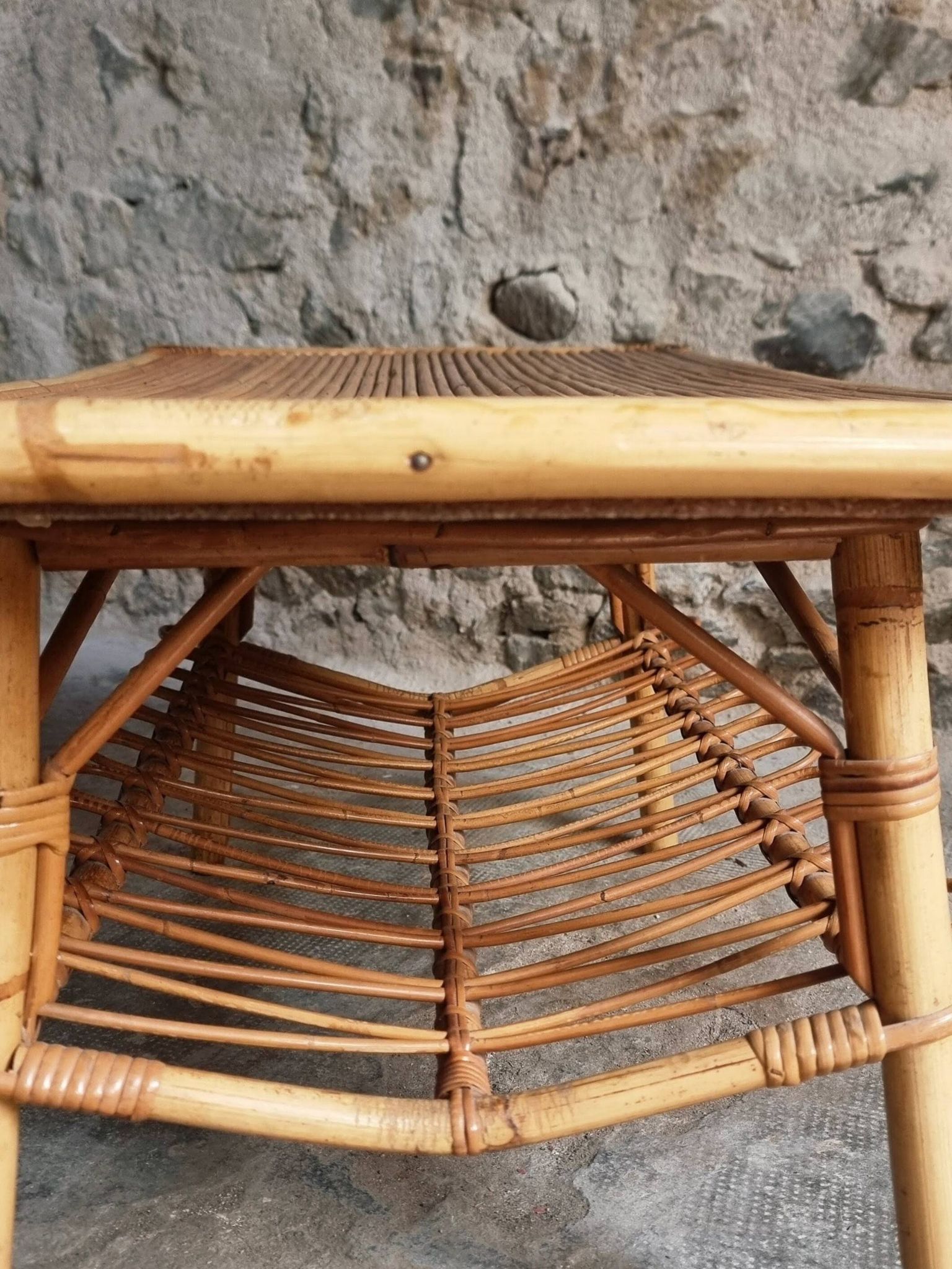 Vintage bamboo and rattan coffee table with magazine rack, French, circa 1960–1970.