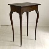 Side table with curved legs