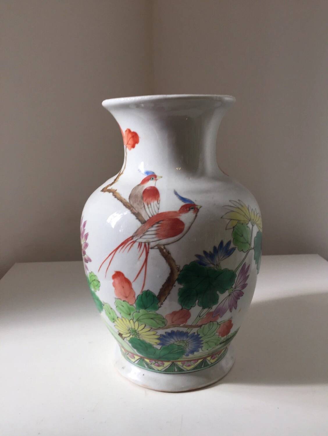 Antique Chinese ceramic vase with painted bird decoration