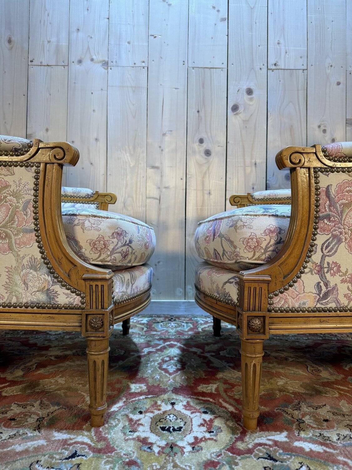 Pair of armchairs / bergères and footstool in Louis XVI style