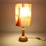 Wooden floor lamp with low printed shade