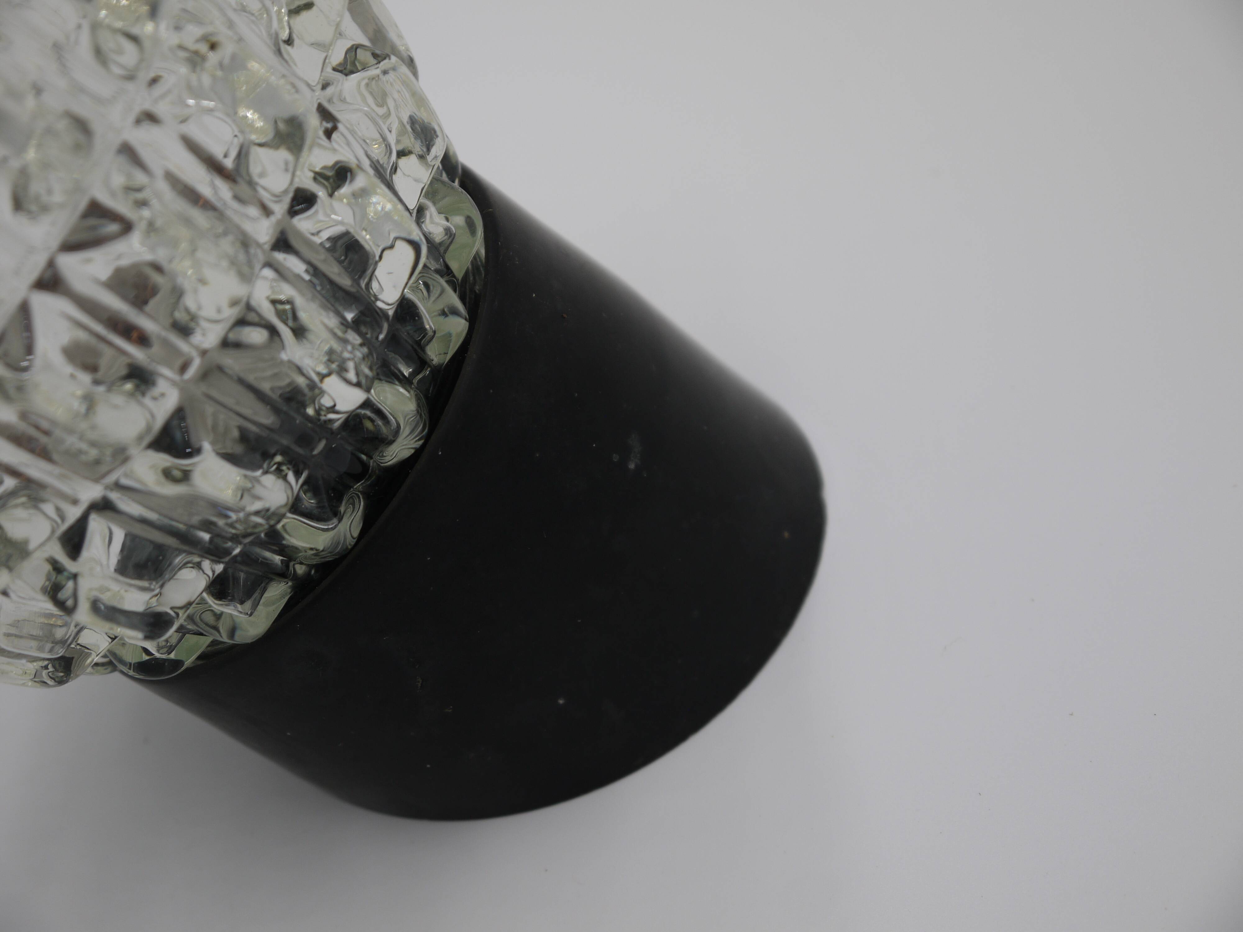 Oblique ceiling lamp in molded glass