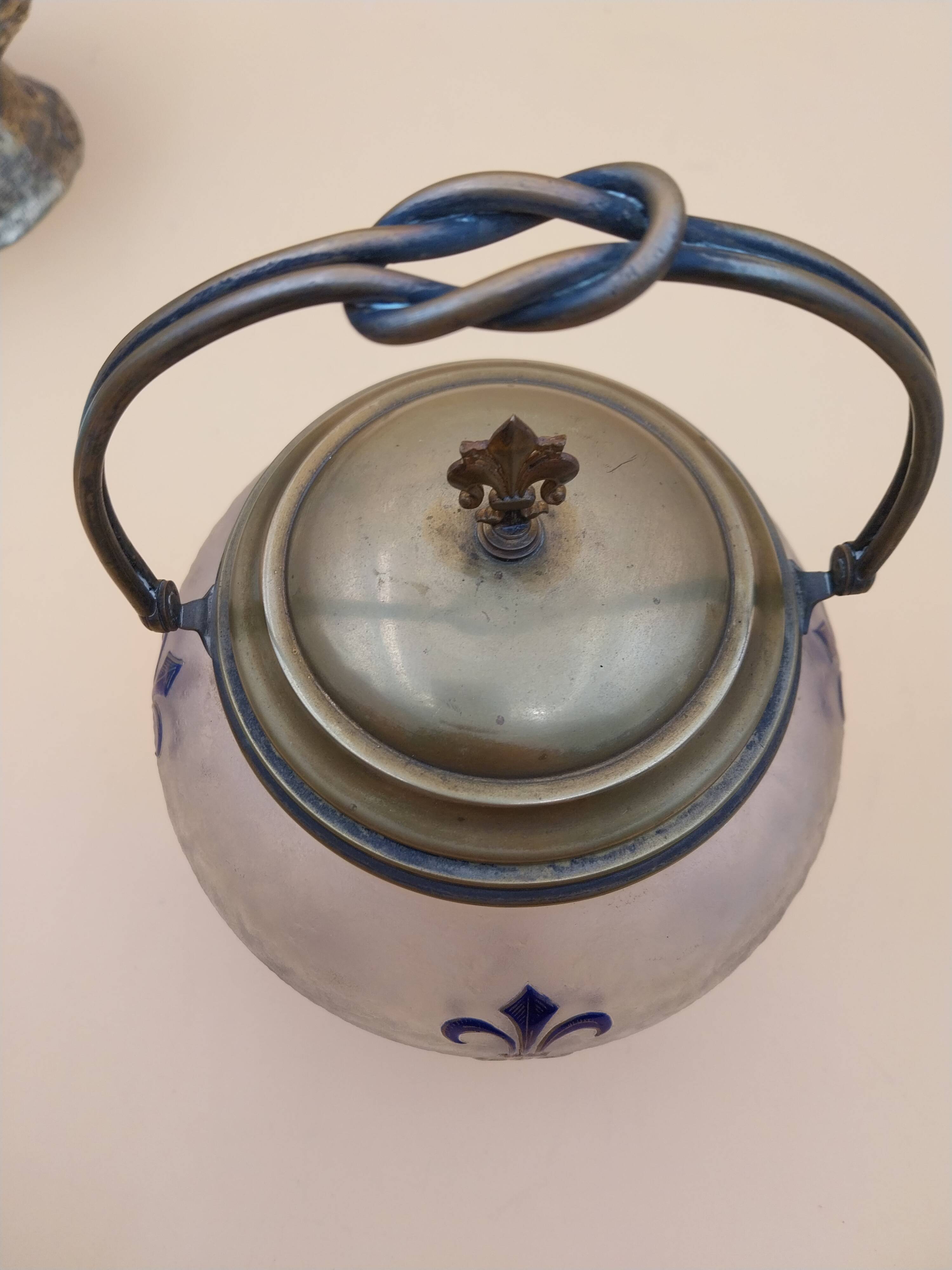 Crystal biscuit jar decorated with blue enamel and gilding.