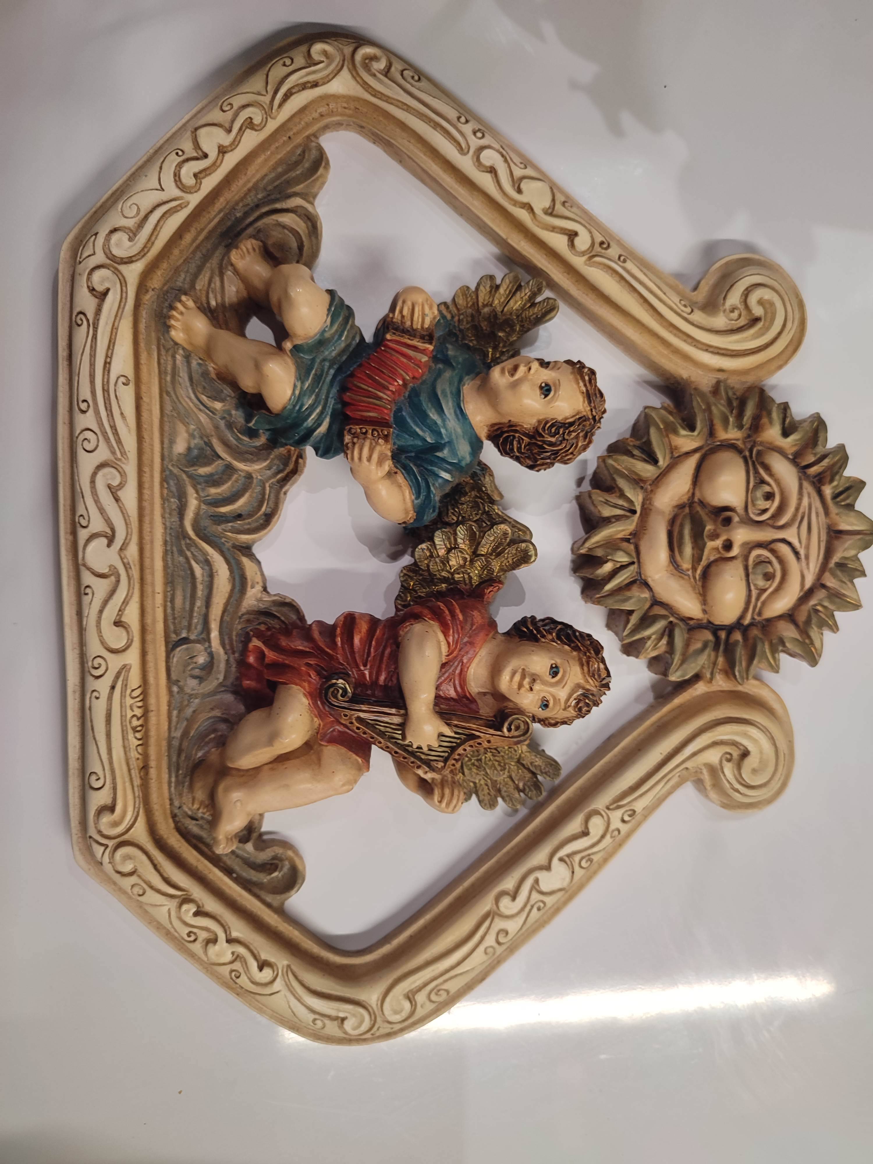 Very realistic angel figurines in resin, signed and handmade in Italy.