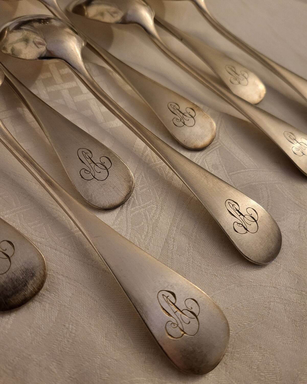 10 silver plated metal table spoons