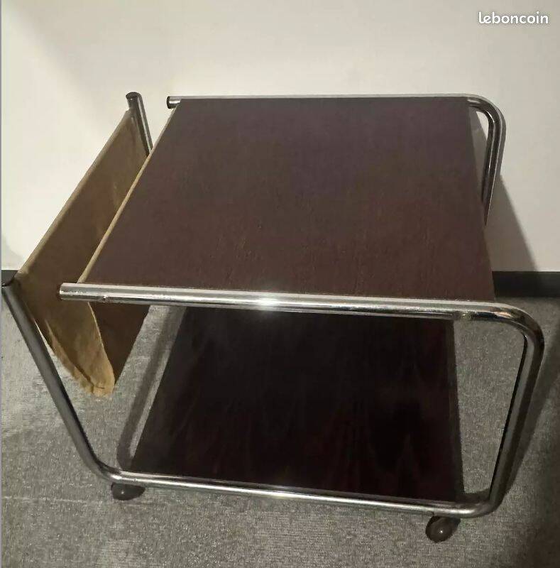 1970s/80s coffee table on casters with metal tubing, light-colored door