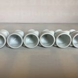 Six white hen egg cups