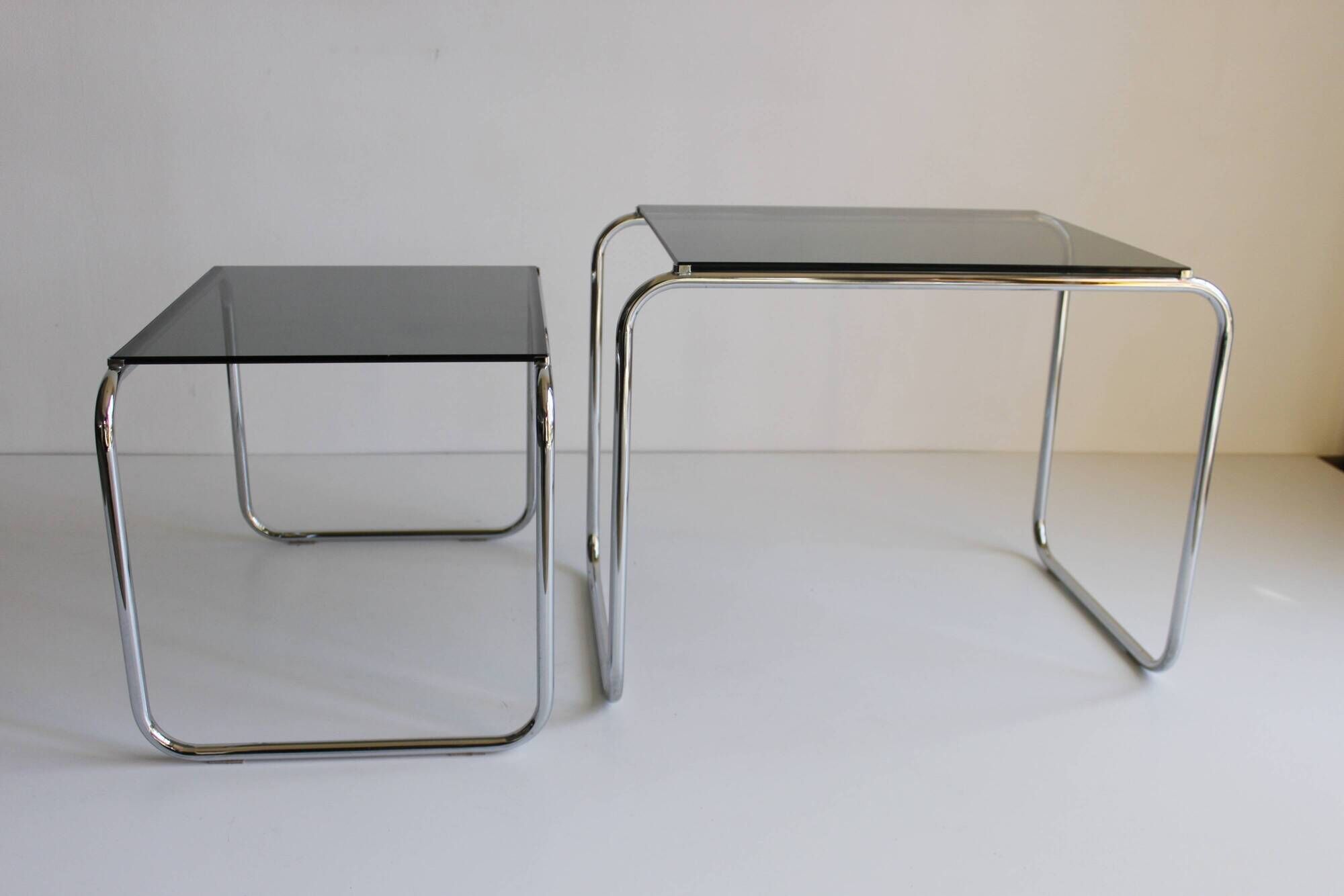 Tubular steel and smoked glass side tables, set of 2