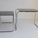Tubular steel and smoked glass side tables, set of 2
