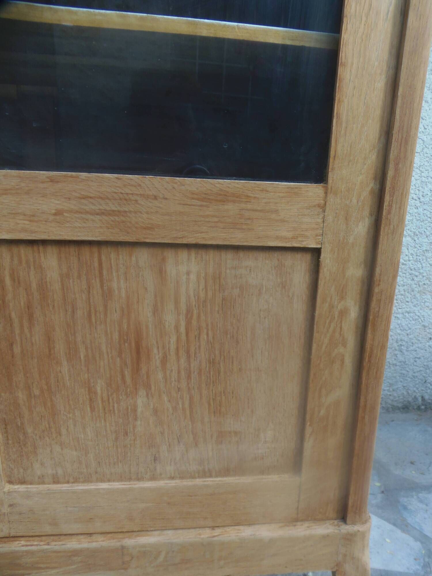 Charming vintage display cabinet from the 1950s in natural wood.