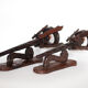 Pair of brutalist wood candle holders
