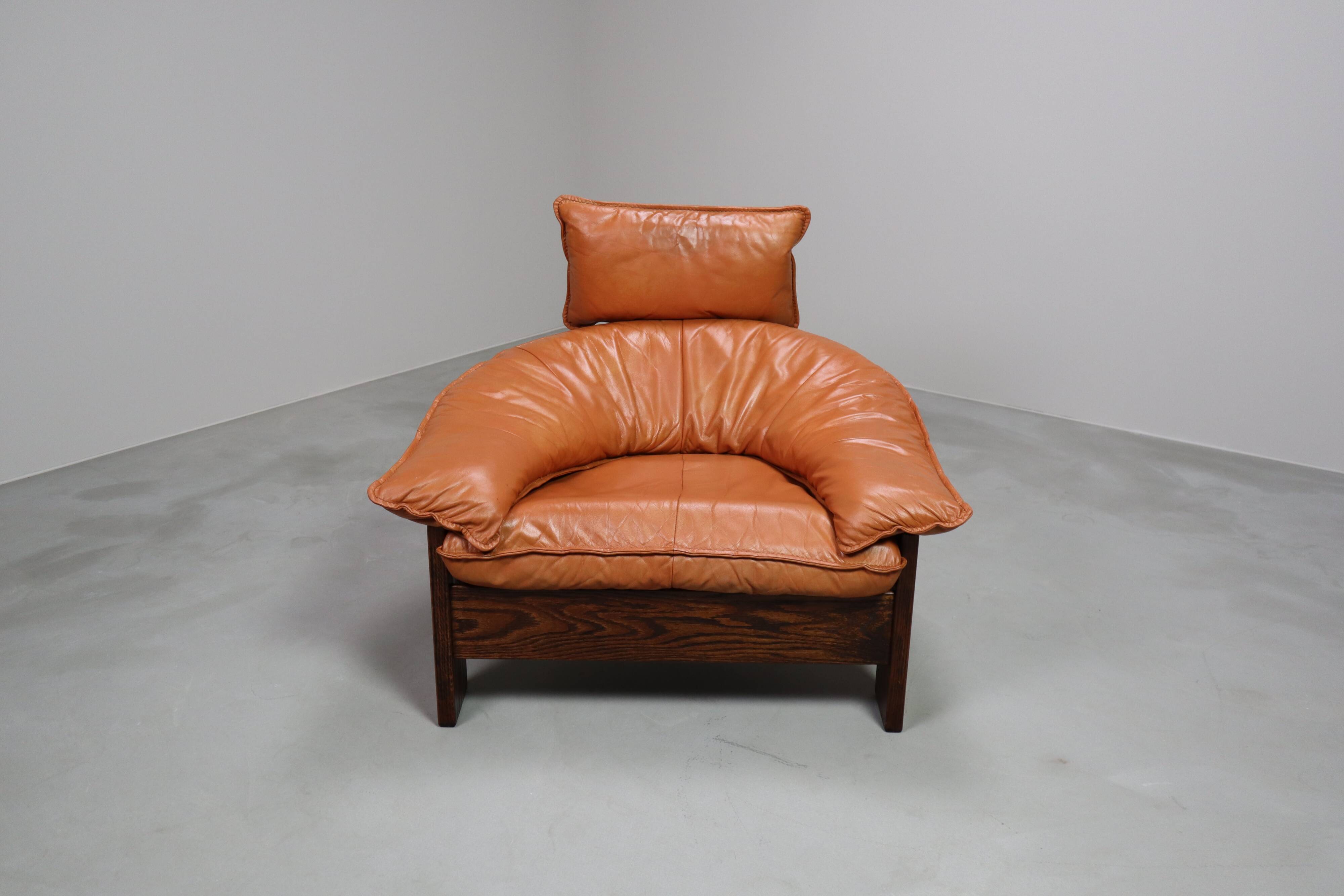 Vintage tripod lounge chair in leather, rattan and oak, Netherlands