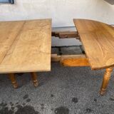 8-legged ash table with 6 extensions.
