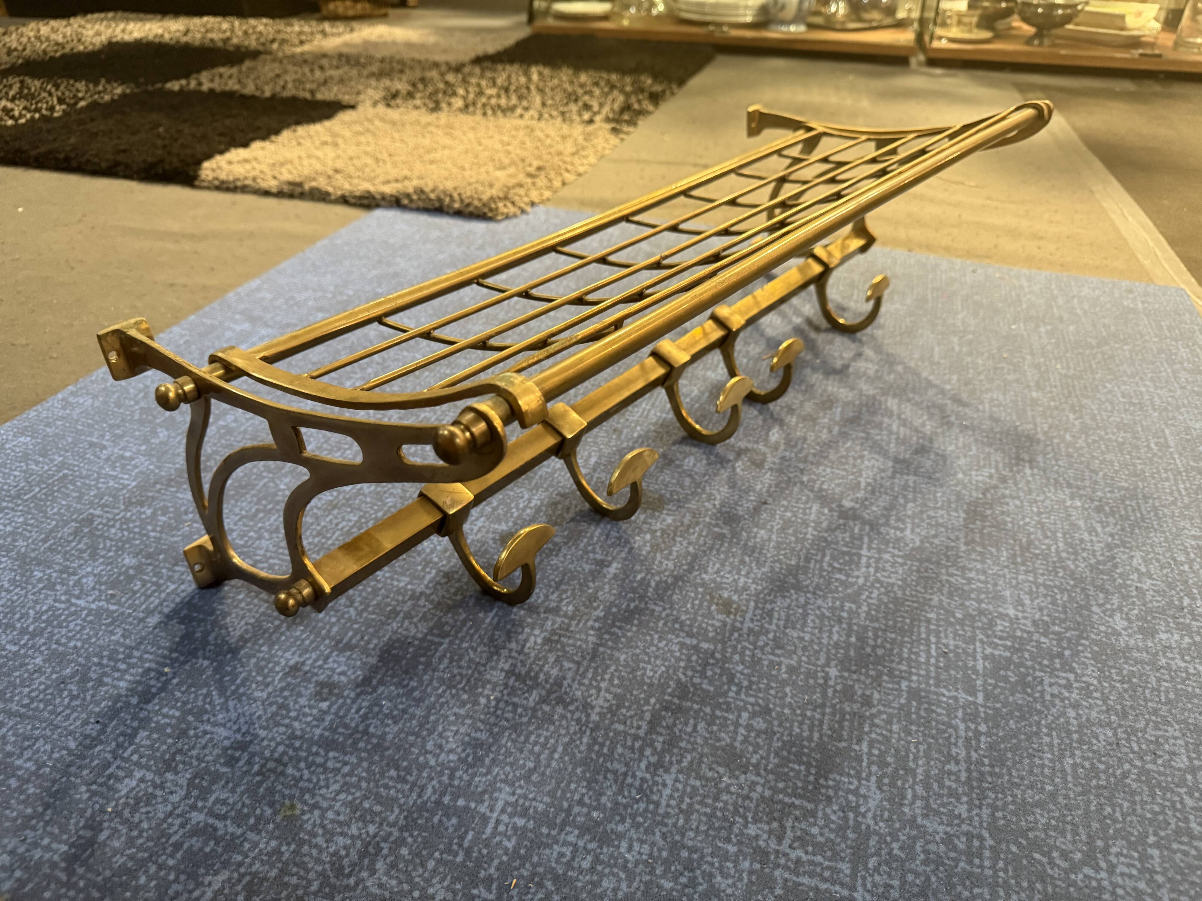 Brass train shelf