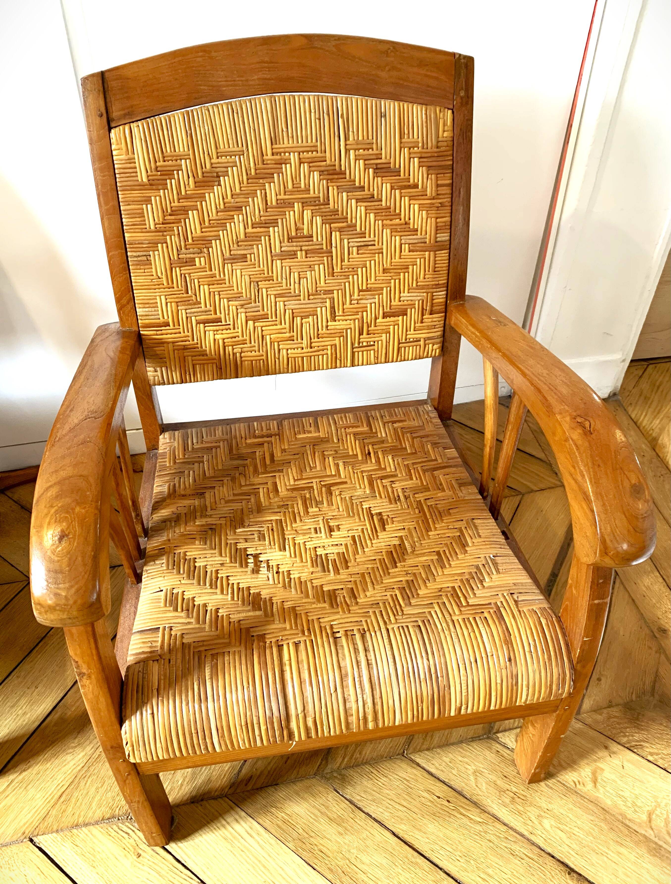 Two contemporary teak and rattan armchairs
