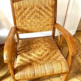 Two contemporary teak and rattan armchairs