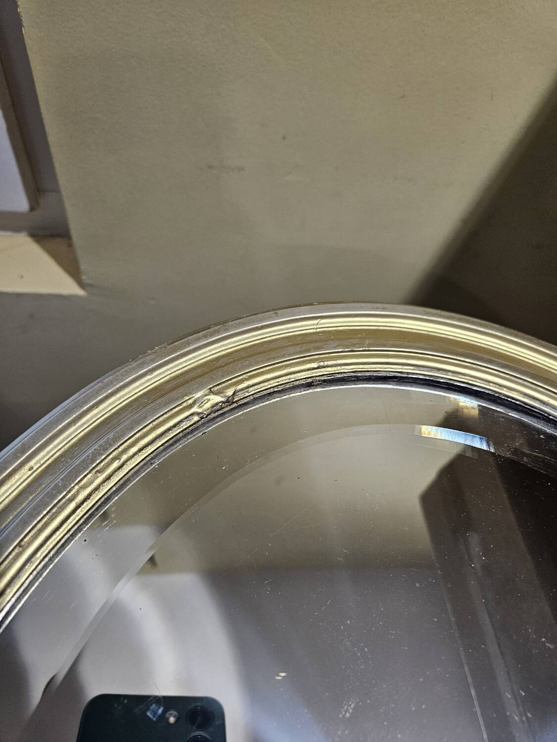 Bevelled oval mirror