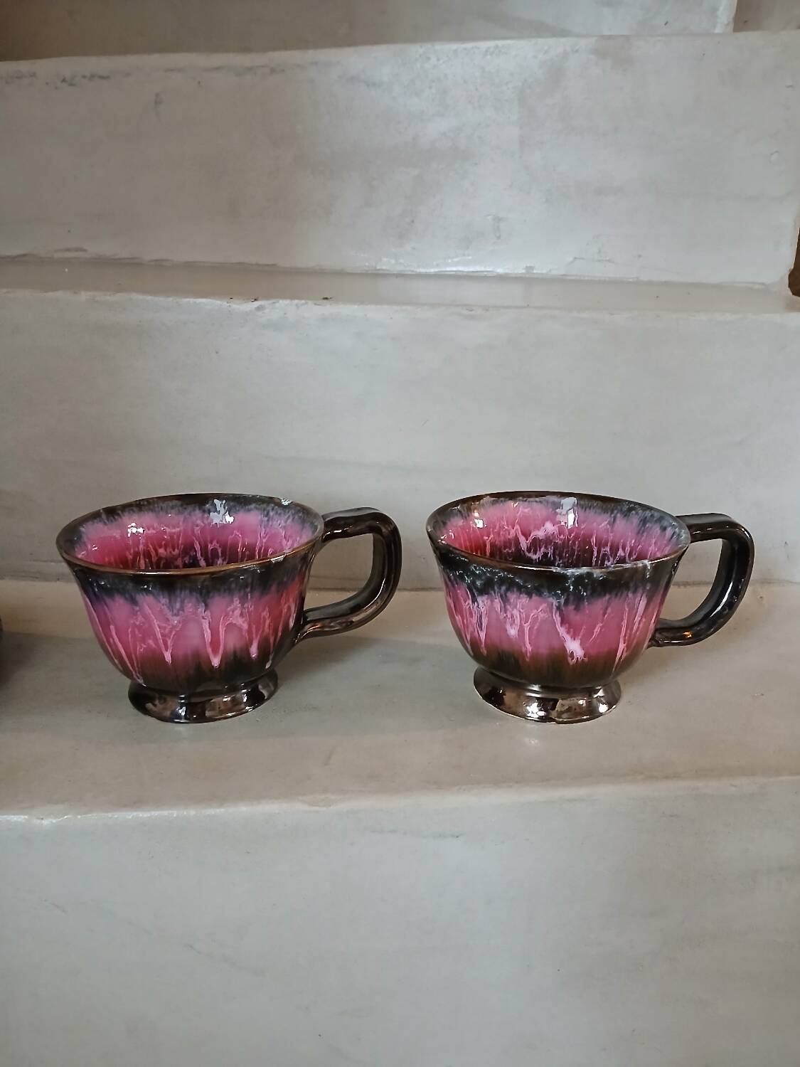 2 vintage cups and saucers