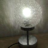 Duo of lamps in textured globe with a great play of light.