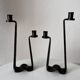 Brutalist wrought iron candlestick pair