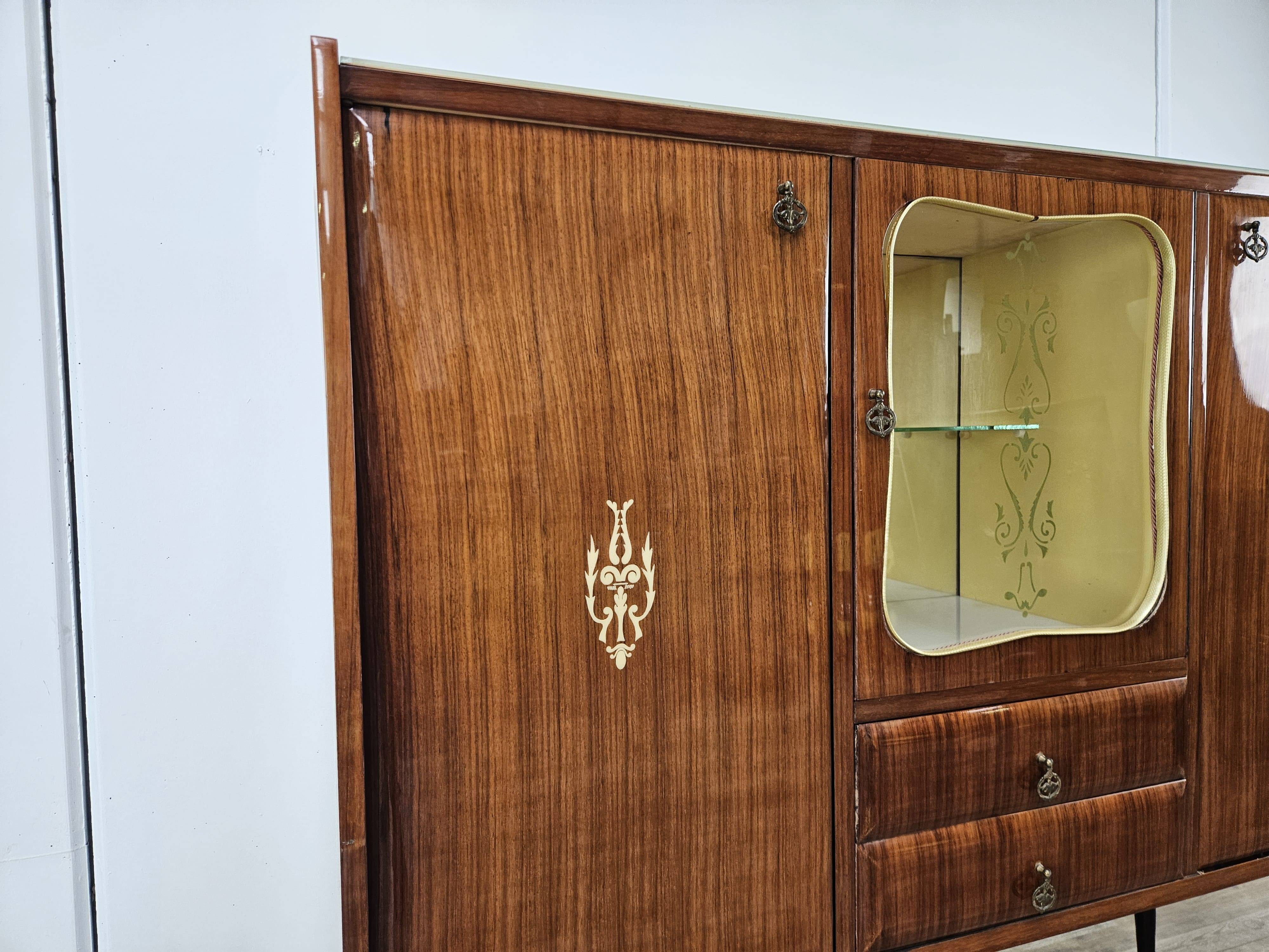 Mid-century 1960s mahogany showcase with glass top
