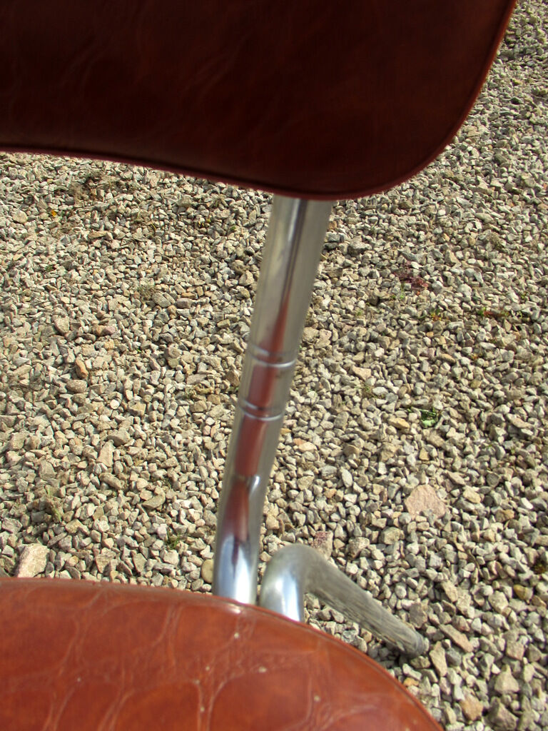 Suite of 4 skai and chrome chairs (total 5 chairs)