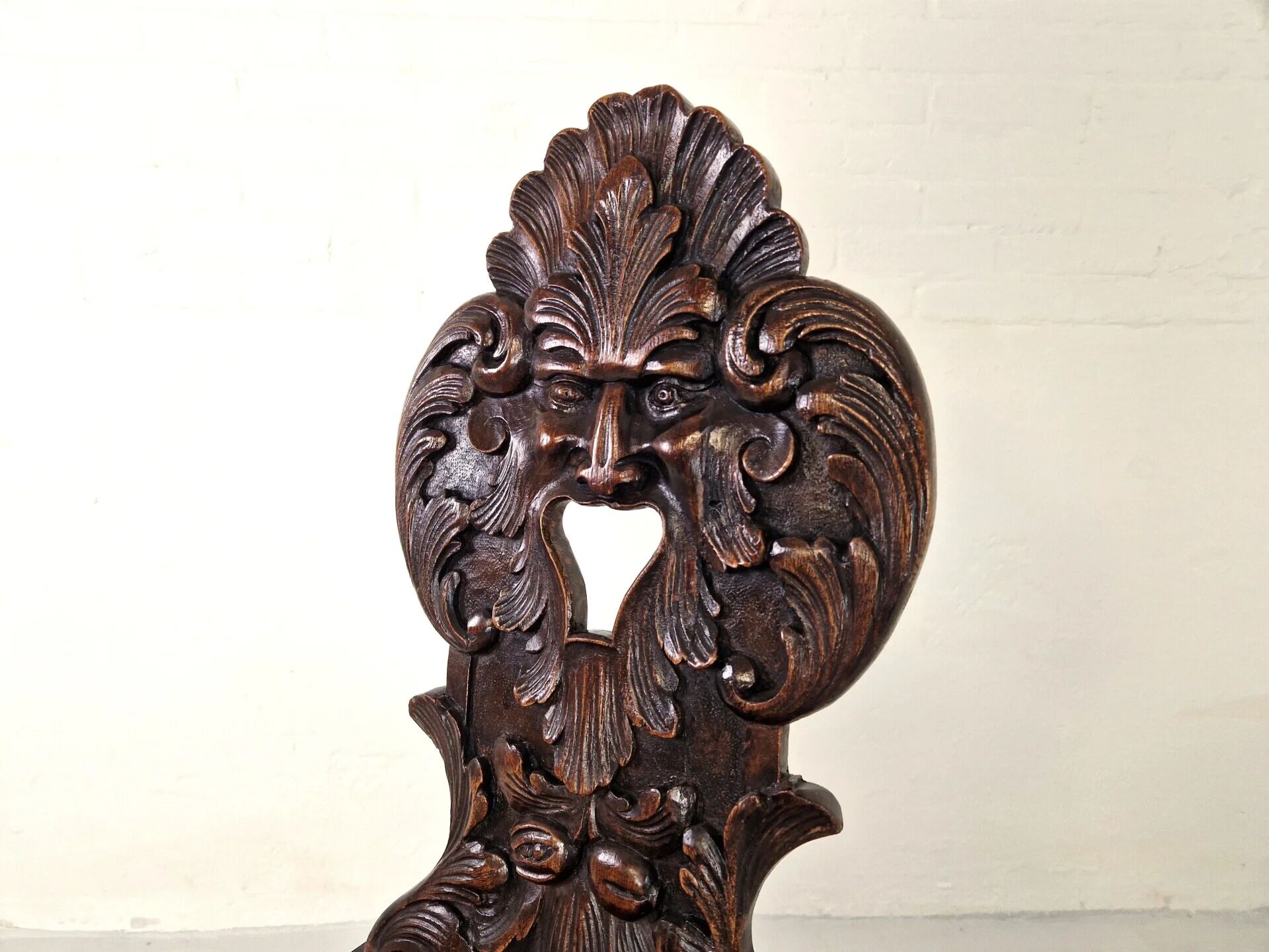 Antique Gothic hall chair with bobbin legs