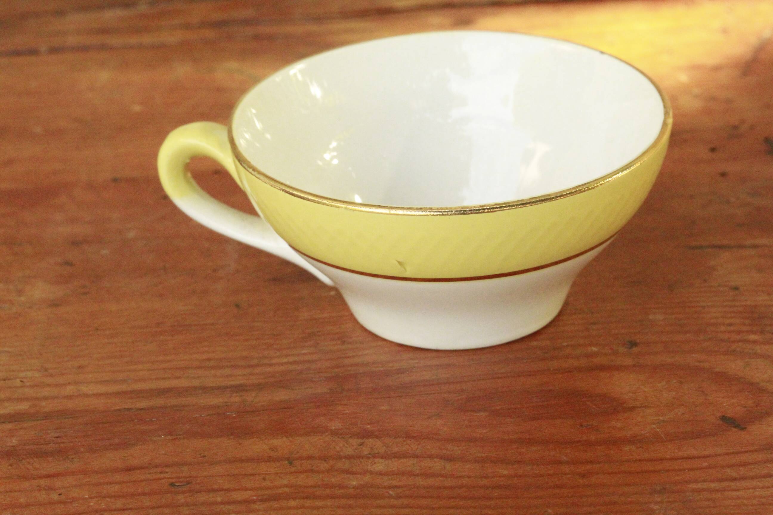 lot of old cups and saucers