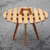 Vintage coffee table, wooden table with central handle, interior decoration, terrace, patio