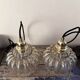 Set of two amber glass pendant lights