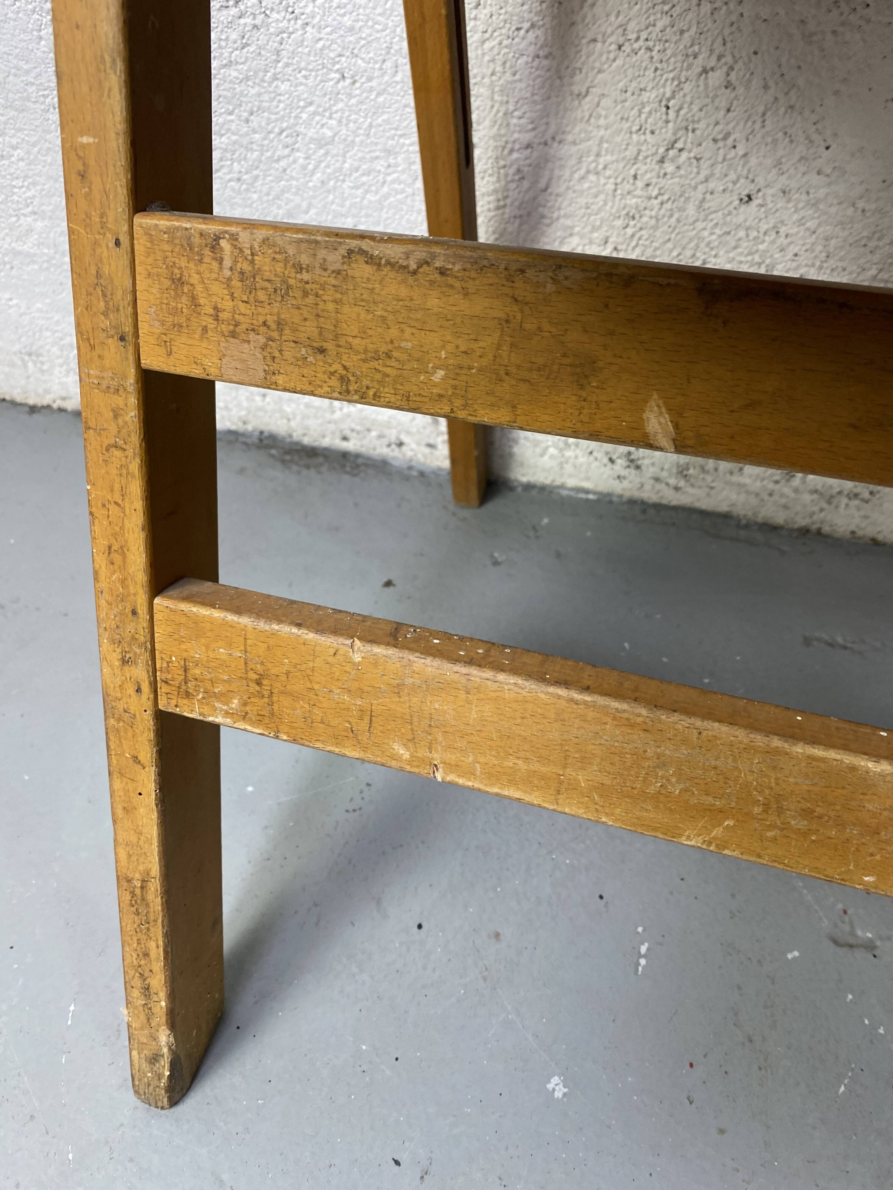 Pair of mismatched wooden folding chairs
