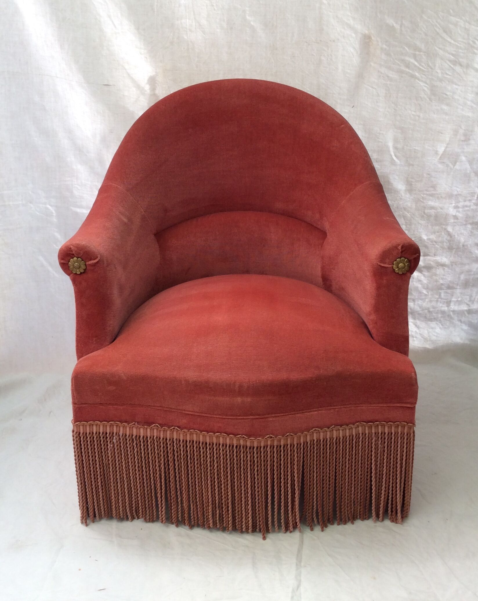 Pink velvet toad chair in the 1960s