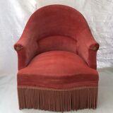 Pink velvet toad chair in the 1960s